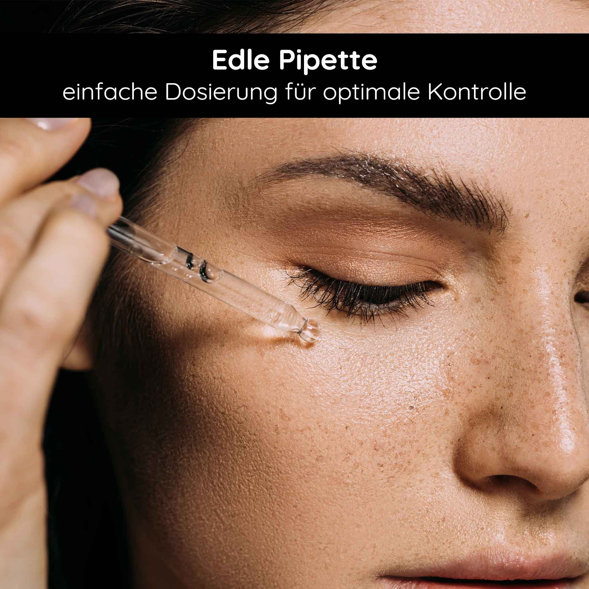 Edle Pipette mit Selbstbräuner-Tropfen für einfache Dosierung und optimale Kontrolle auf dem Gesicht einer Frau mit makelloser Haut.