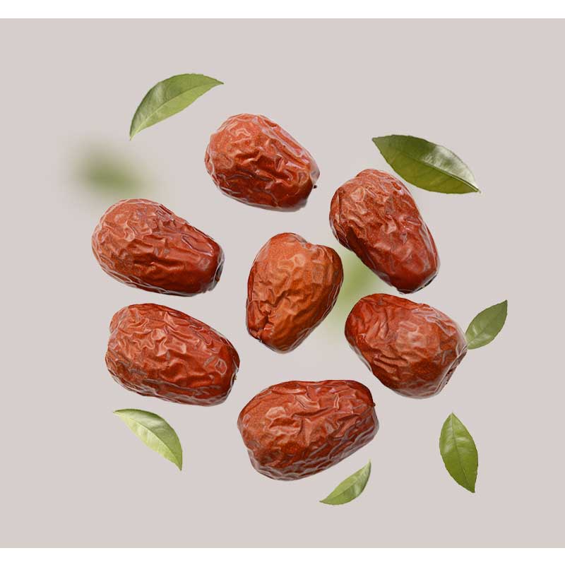 jujuba Jujuba-Frรผchte mit grรผnen Blรคttern reprรคsentieren natรผrliche Inhaltsstoffe in der Luxus-Hautpflege, verwandt mit dem Golden Hyaluron Gel von RAU Cosmetics fรผr Anti-Aging und Feuchtigkeitsversorgung.