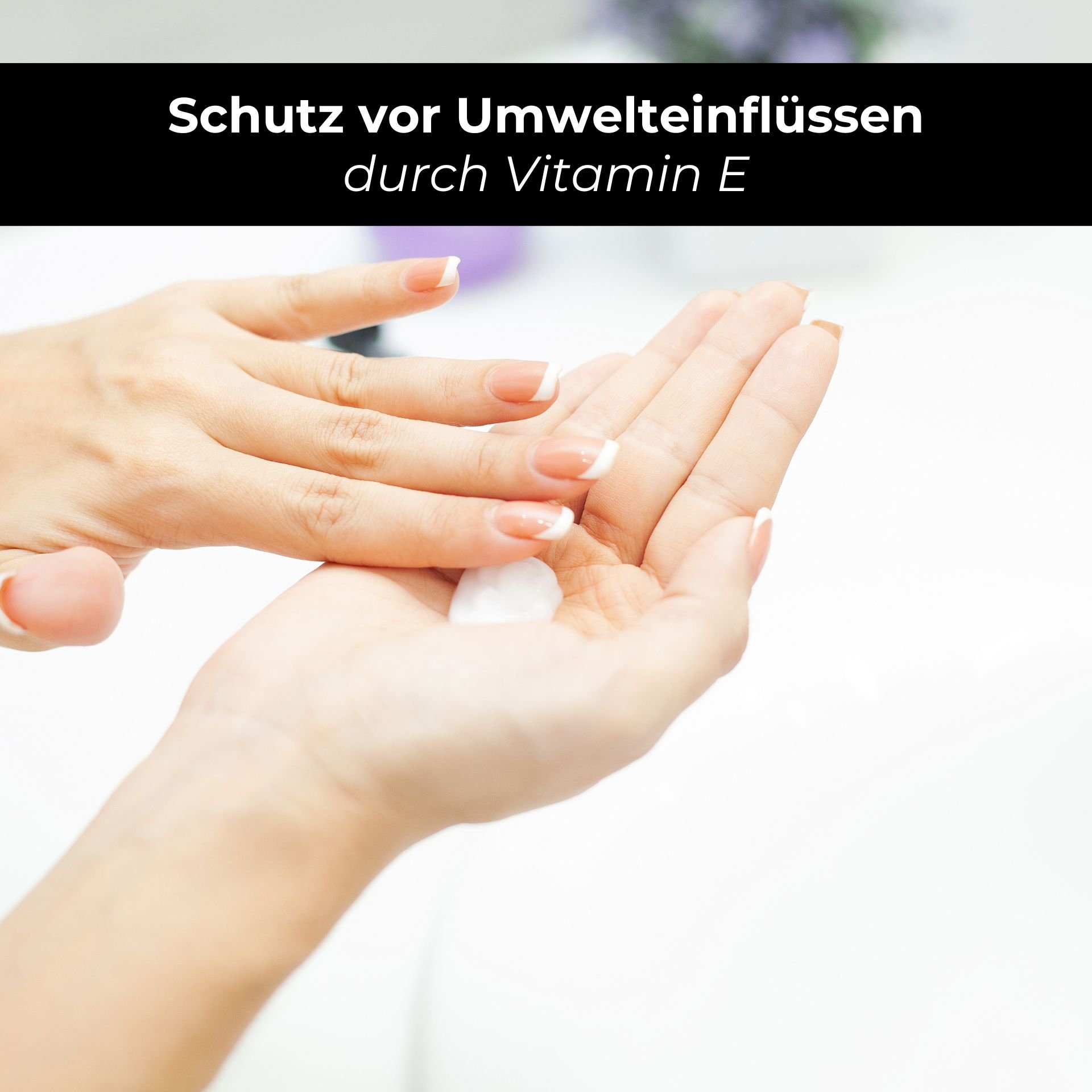 Hands applying a moisturizing lotion, focusing on protection from environmental influences through Vitamin E, suitable for RAU Cosmetics body lotion for dry skin.