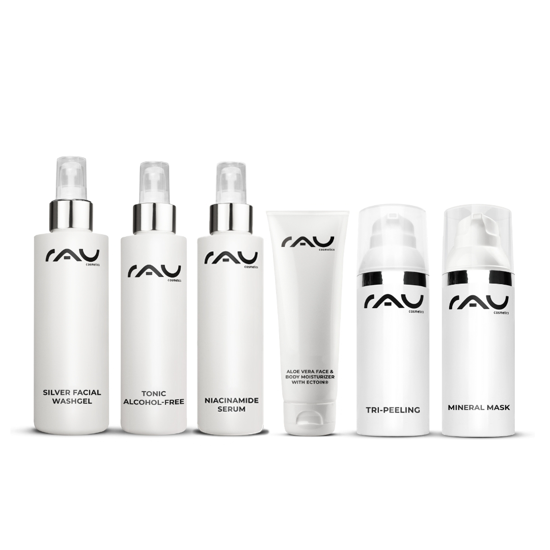 Profi Pflegeroutine für Mischhaut Profi Pflegeroutine für Mischhaut von RAU Cosmetics, bestehend aus sanftem Reinigungsgel, alkoholfreiem Tonic, Niacinamid-Serum, Aloe Vera Feuchtigkeitsgel, Tri-Peeling und Mineralmaske, präsentiert in eleganten weißen Flaschen mit schwarzem Logo.
