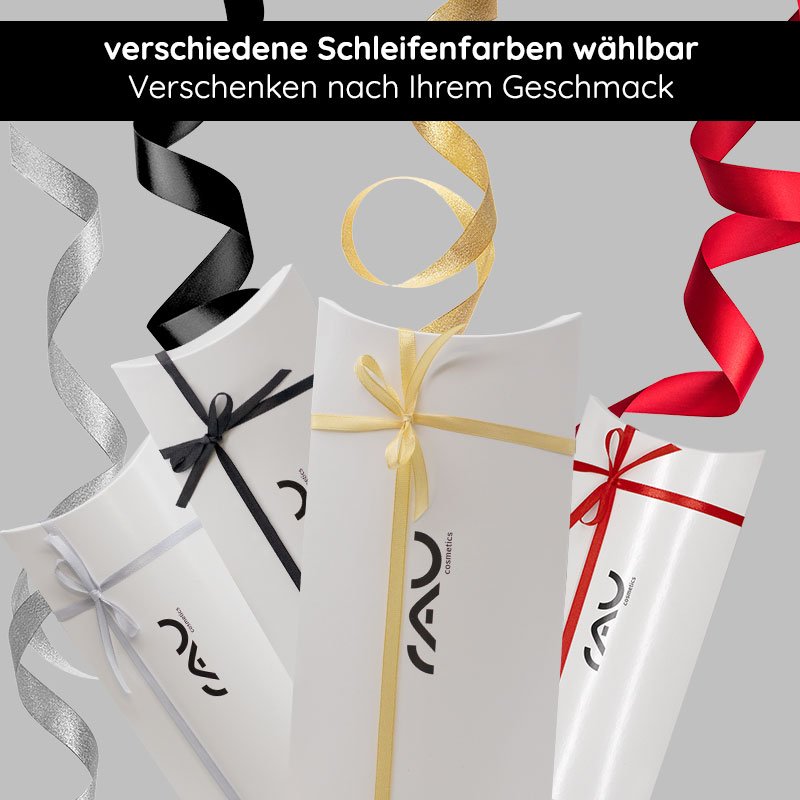 Geschenkverpackung "Kissen" von RAU Cosmetics in verschiedenen Farben mit Schleifen, ideal für besondere Anlässe wie Weihnachten oder Geburtstage.
